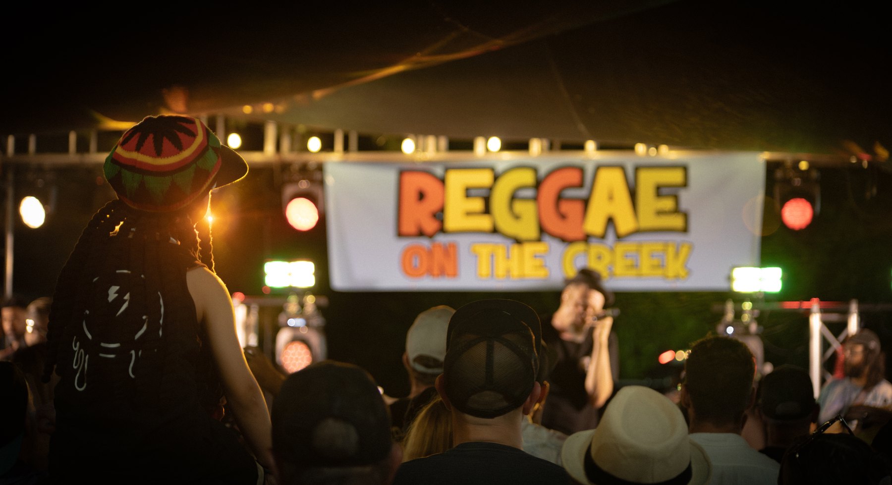 Reggae on the Creek stage and audience after dark