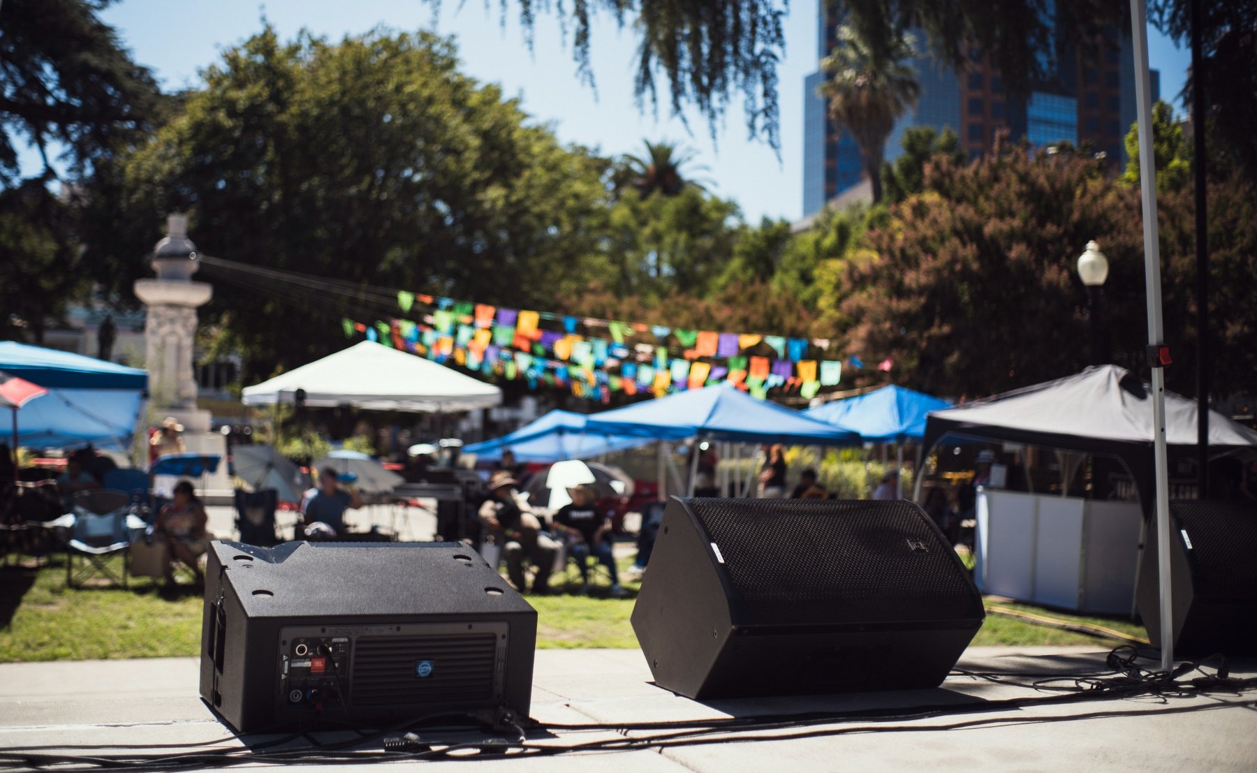 Stage monitors and festival grounds before a Tejano Conjunto Festival performance in downtown Sacramento